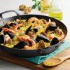 imageTramontina Carbon Steel 15Inch Paella Pan Naturally Non Stick Oven Safe