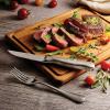 imageTramontina Churrasco 8Piece Silverware Set 5Inch Stainless Steel HighCarbon Blade Pointed Tip Kitchen Steak Knives and Forks DishwasherSafe8piece
